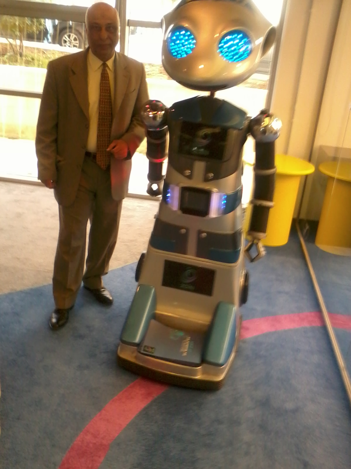 Engineer Khattab Omar Abuisbae, at "MENA ICT Forum 2014, With The  Amazing "Robotic Man", Amman City, Jordan.