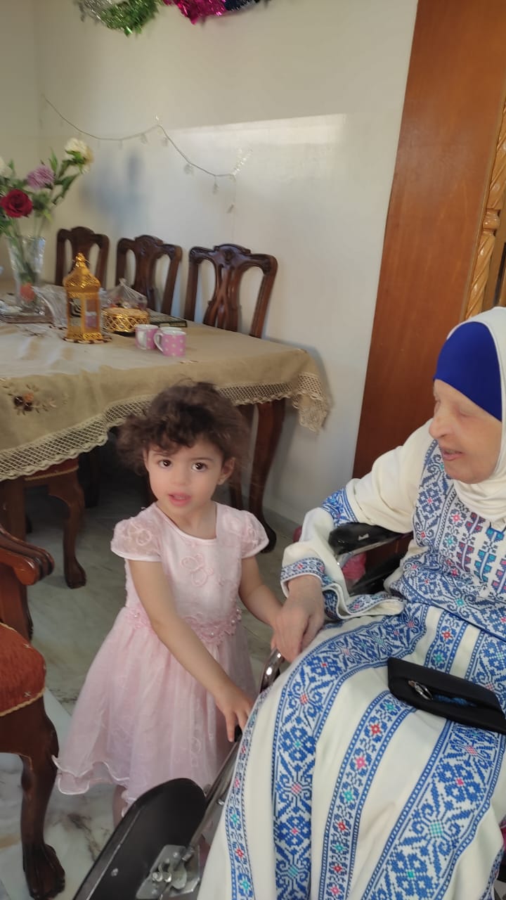 Engineer Khattab Omar Abuisbae's Mother "Khadeja Khaleel Aboosba", and her grand daughter "Waed", at His apartment, Amman City, Jordan, Year 2023, Photo1.