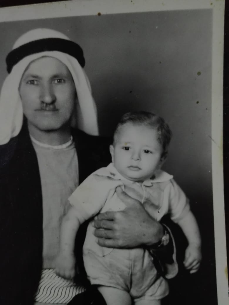 My Great Beloved Lovely  Grand-father "Khaleel Ahammad Aboosba", Carrying me "Engineer Khattab Omar Abuisbae", "Zarka City, Amman, Jordan, Year 1958, Photo 107.