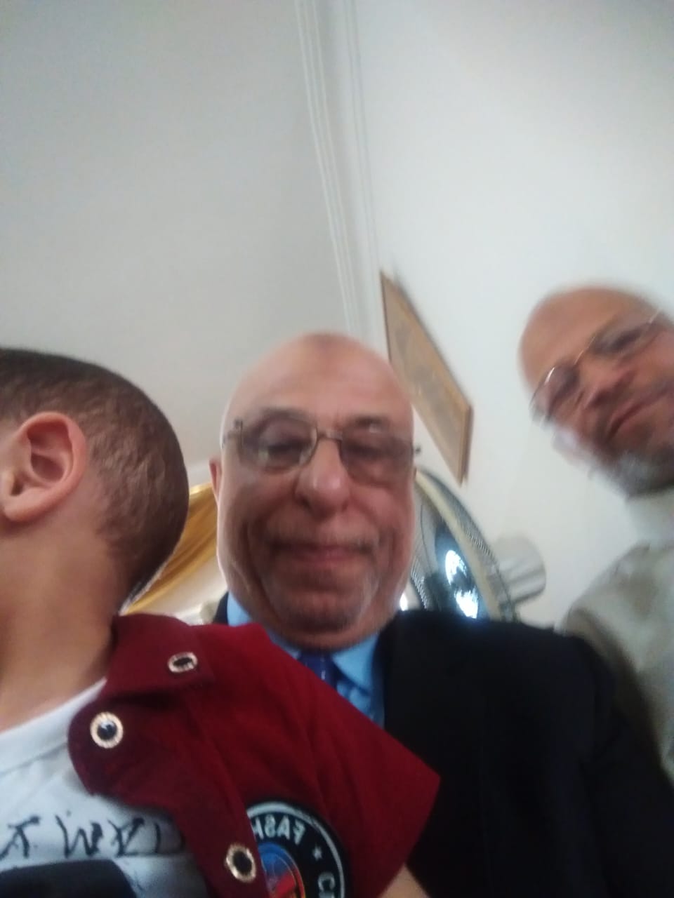 In The Middle "Engineer Khattab Omar Abuisbae", Carrying His Great Beloved Lovely Niece Mr. "Obbada Belal Aboosba", Next his dad, my brother "Belal", at my apartment, "Celebrating Eied's Visit", Amman City, Jordan, Year 2017, Photo131.