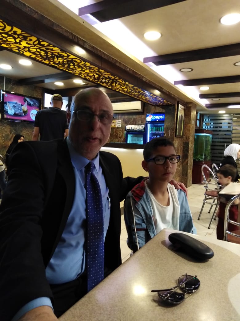 Engineer "Khattab Omar Abuisbae", And My Great Beloved Lovely Niece Mr. "Aws Mohammad Omar Aboosba",
Aboosba", at "Alnejma Sweets Shop", "Albayader Main Street", "Hay Alrawanaq ", Amman City, Jordan, Year 2016, Photo138.