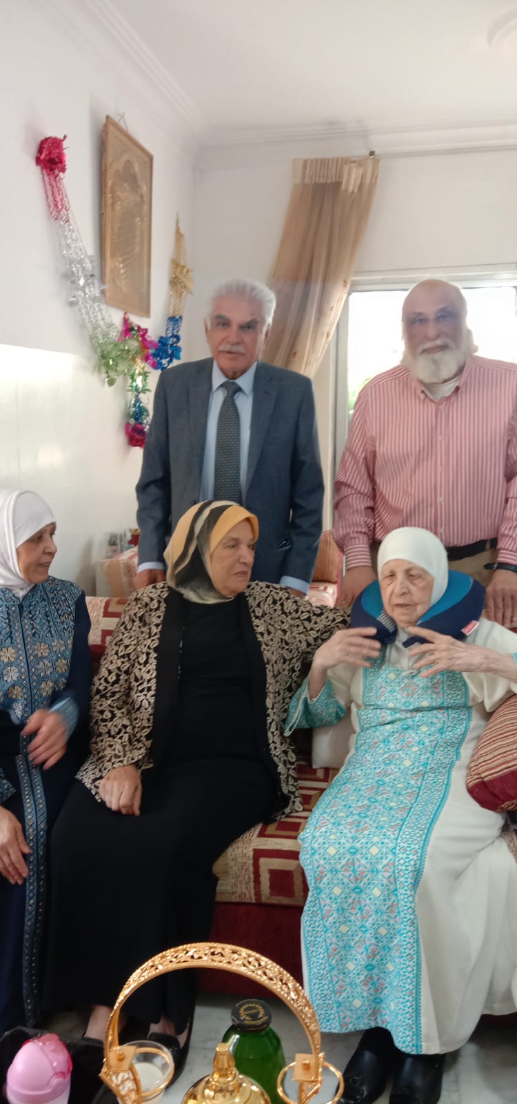 Standing Up Raw, from Right to Left, Engineer "Khattab Omar Abuisbae", Then "Dr. Abduallah Alkeswanie", Setting Raw, from Right to Left, My Great Beloved Mother "Khadeja Khaleel Aboosba", Next to her , her sister my unt "Dr. Nejma Khaleel Aboosba", Then my sister "Soha Omar Aboosbae", Celebrating Eied, Year 2022, at my apartment, Amman City, Jordan.