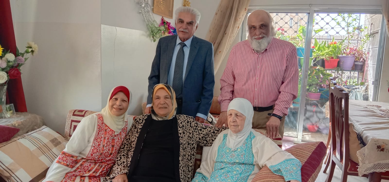 Standing Up Raw, from Right to Left, Engineer "Khattab Omar Abuisbae", Then "Dr. Abduallah Alkeswanie", Setting Raw, from Right to Left, My Great Beloved Mother "Khadeja Khaleel Aboosba", Next to her , her sister my unt "Dr. Nejma Khaleel Aboosba", Then my sister "Nisreen Omar Aboosbae", Celebrating Eied, Year 2022, at my apartment, Amman City, Jordan.