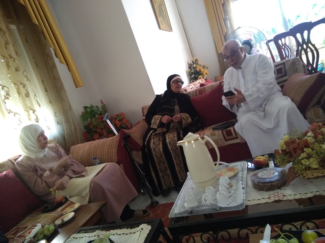 From Right to Left, Engineer "Khattab Omar Abuisbae", Then his relative unt "Aysha Ebraheem Alsalam", Then next to her, My Great Beloved Lovely Mother "Khadeja Khaleel Aboosbae", at her and his apartment, Amman City, Jordan, Year 2022.