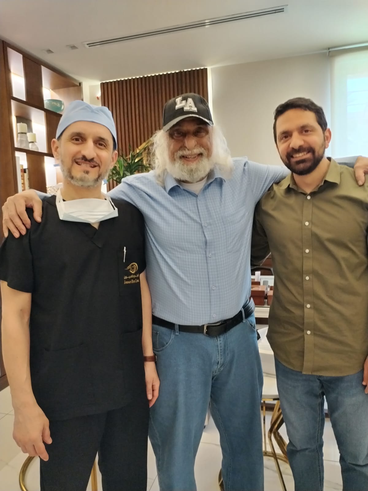 Engineer Khattab Omar Abuisbae's Medical Surgent Doctors of His Eyes, From left to Right, Dr. Motaz Harara and Dr. Maen's Photo2